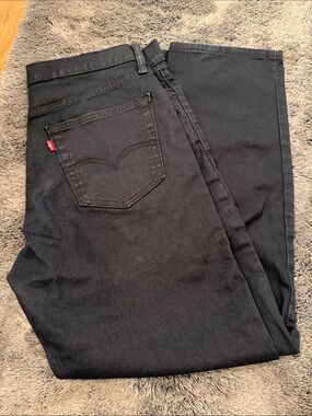 Levi’s  Men’s 33x30 dark denim blue wash jeans. Knew without tags.